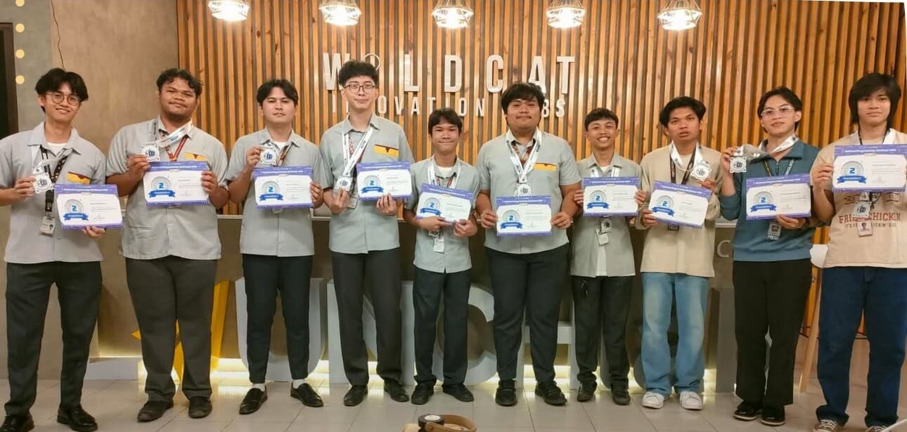 Reev Santillan and the CIT-U CCS team holding their certificates after placing first runner-up at the CodeChum National Programming Challenge, 2025.