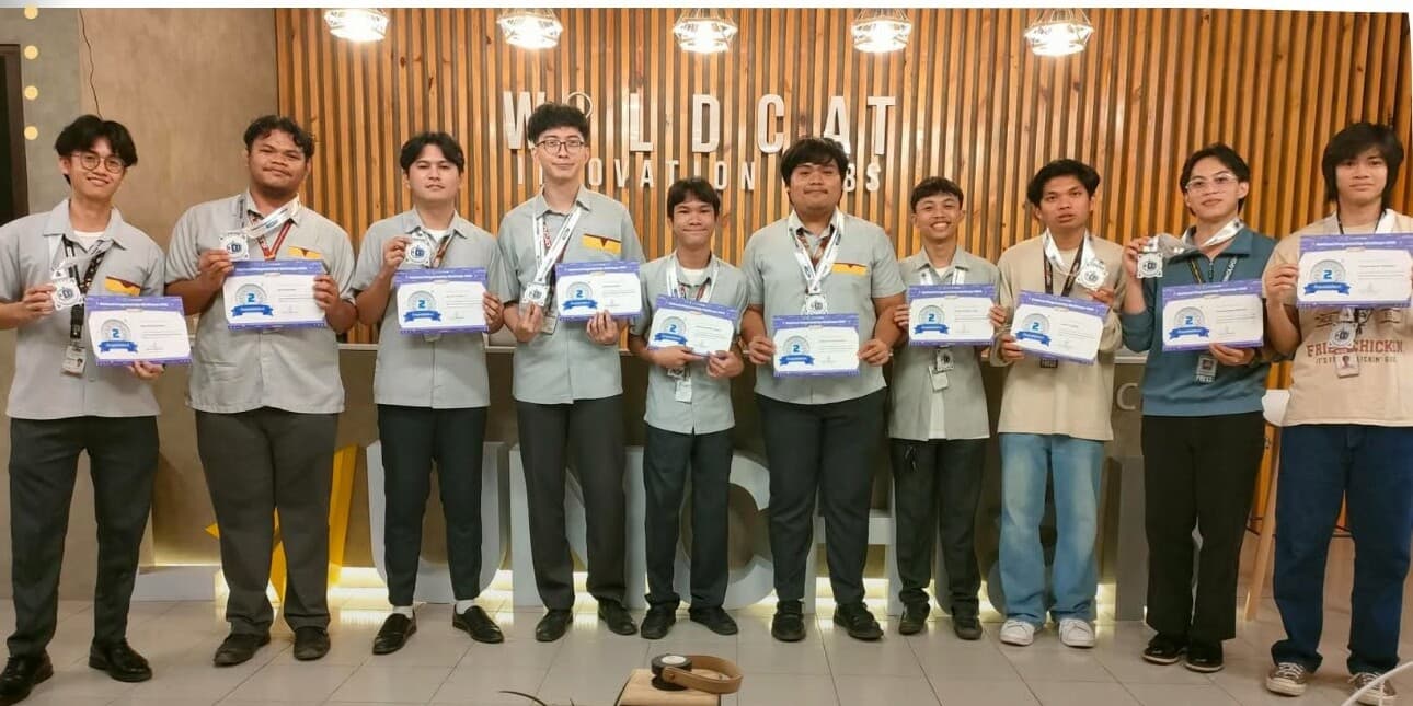 Reev Santillan and the CIT-U CCS team holding their certificates after placing first runner-up at the CodeChum National Programming Challenge, 2025.